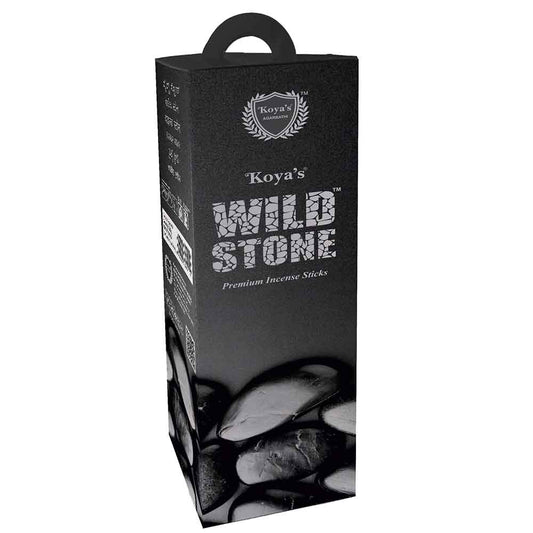 Tall black hexagonal box of Koya's Wild Stone incense sticks with a textured stone finish and a carrying handle. The packaging features the Koya's Agarbatti crest and a black-and-white image of smooth river stones at the base.