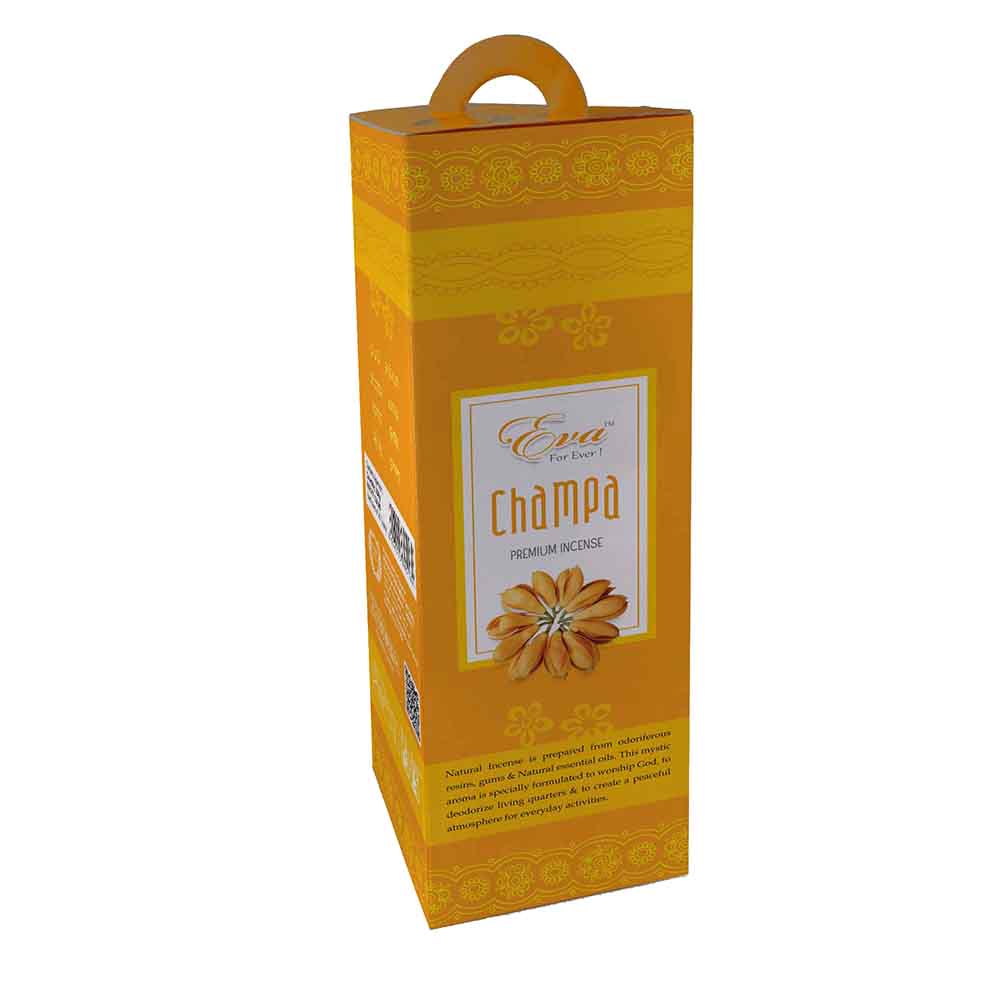 Tall yellow and orange hexagonal box of Eva champa premium incense with a traditional pattern and carrying handle. The front label features an illustration of a golden champa flower and describes the natural aroma as ideal for worship and peaceful everyday activities.