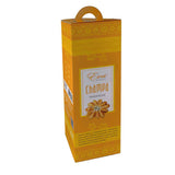 Tall yellow and orange hexagonal box of Eva champa premium incense with a traditional pattern and carrying handle. The front label features an illustration of a golden champa flower and describes the natural aroma as ideal for worship and peaceful everyday activities.