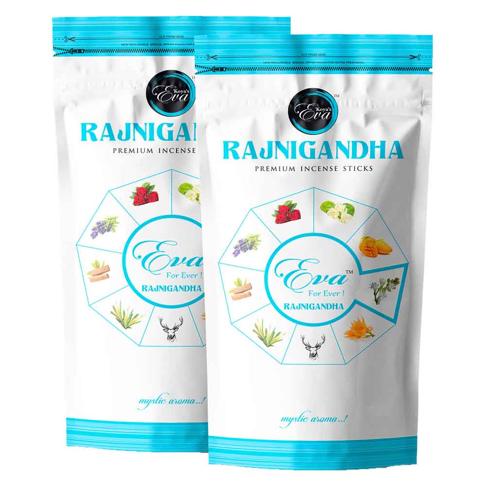 Two pouches of Koya's Eva Rajnigandha premium incense in a white and light blue zipper pouch. The packaging features an octagonal diagram of various natural ingredients like strawberry, jasmine, and sliced mango, with the label describing a 'mystic aroma'.